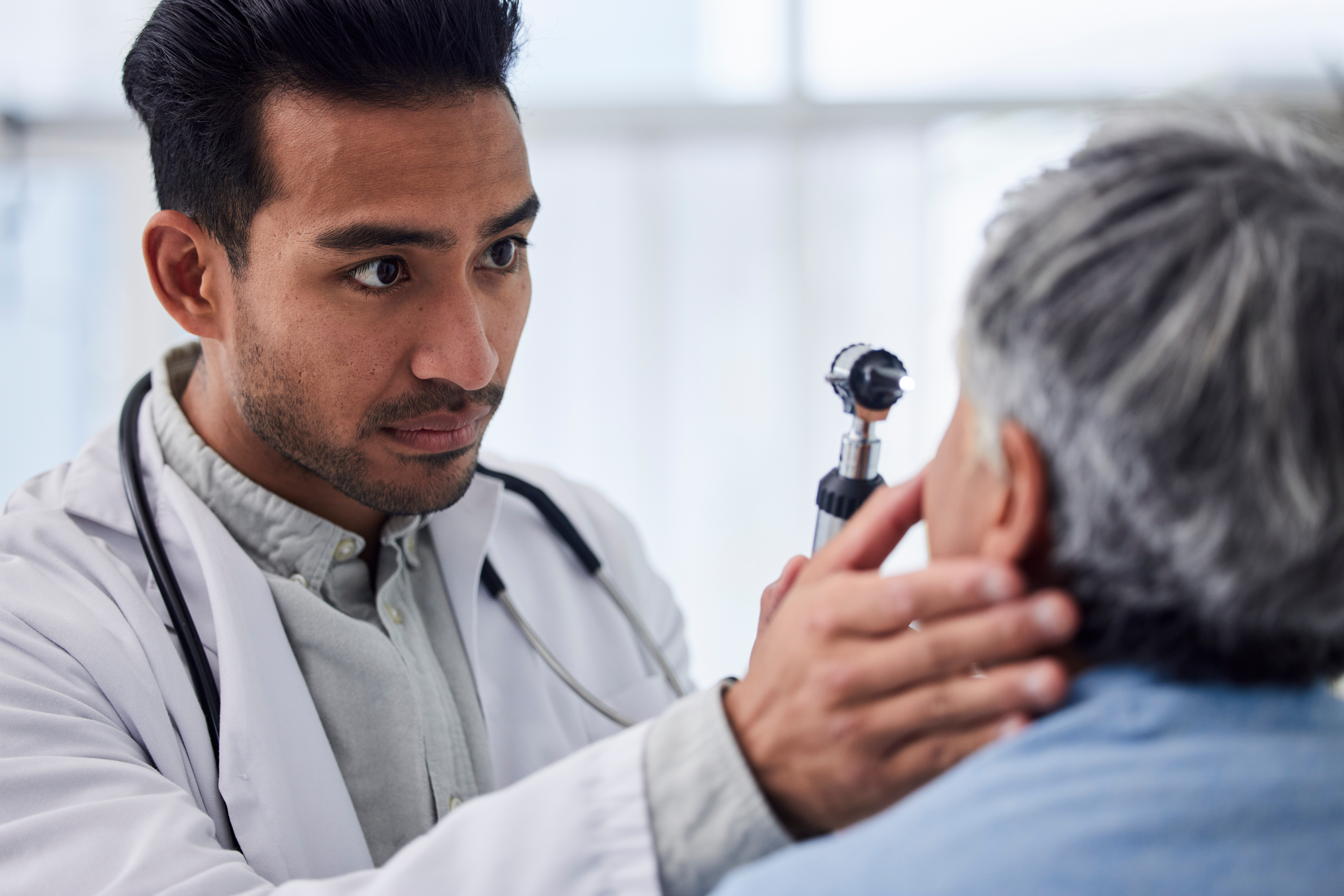 Doctor examining a patient during a comprehensive eye exam
